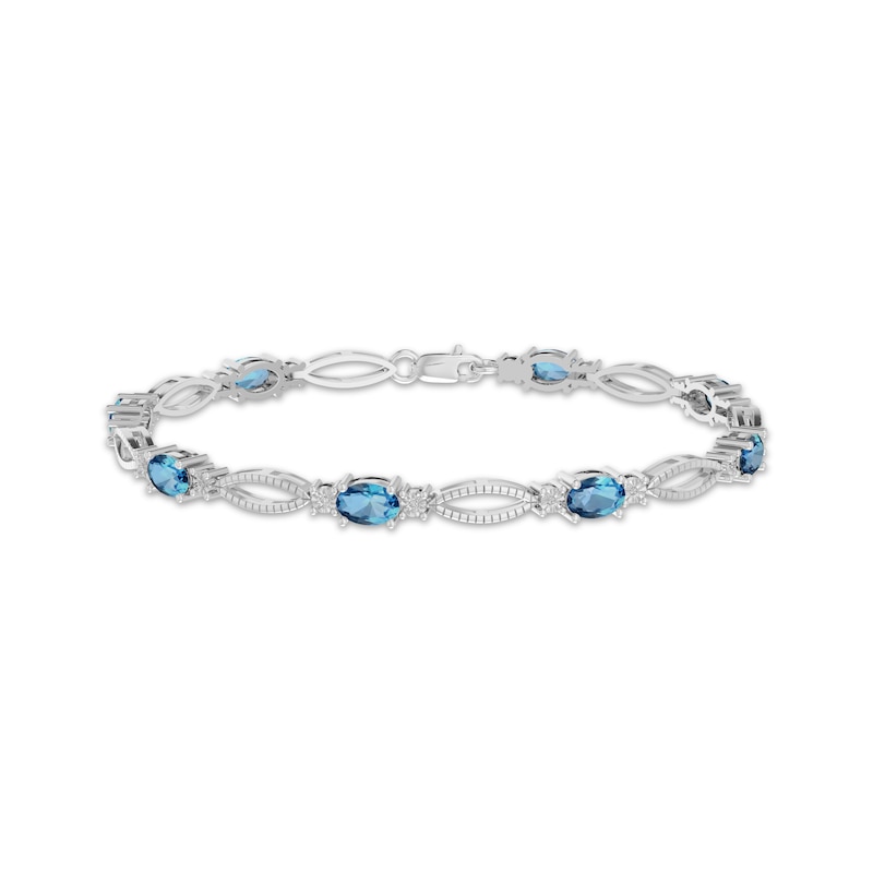 Main Image 1 of Oval-Cut Swiss Blue Topaz & Diamond Accent Bracelet Sterling Silver 7.25"