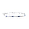 Thumbnail Image 1 of Oval-Cut Blue Lab-Created Sapphire & Diamond Accent Wavy Link Bracelet 7.25"