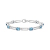Thumbnail Image 1 of Oval-Cut Swiss Blue Topaz Paperclip Chain Bracelet Sterling Silver 7.25"