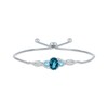 Thumbnail Image 1 of Oval-Cut London Blue Topaz, Round-Cut Swiss Blue Topaz & White Lab-Created Sapphire Bolo Bracelet Sterling Silver