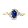 Thumbnail Image 2 of Oval-Cut Blue Lab-Created Sapphire & Diamond Bypass Ring 1/15 ct tw 10K Yellow Gold