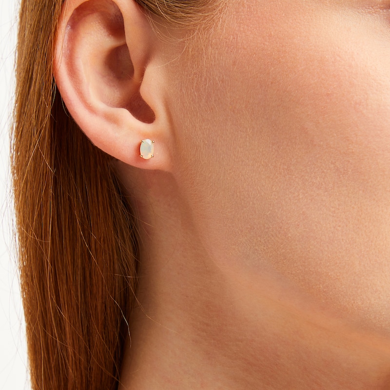 Main Image 3 of Oval-Cut Opal Solitaire Stud Earrings 14K Yellow Gold