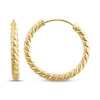 Thumbnail Image 1 of Hollow Twist Hoop Earrings 18mm 14K Yellow Gold