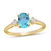 Thumbnail Image 0 of Swiss Blue Topaz & Diamond Ring 1/10 ct tw Oval/Round-Cut 10K Yellow Gold