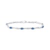 Thumbnail Image 1 of Oval-Cut Swiss Blue Topaz & Diamond Accent Wavy Link Bracelet Sterling Silver 7.25"