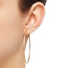 Thumbnail Image 1 of Diamond-Cut Tube Hoop Earrings 14K Yellow Gold 60mm