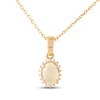Thumbnail Image 1 of Oval-Cut Opal & Diamond Sunburst Halo Necklace 1/15 ct tw 10K Yellow Gold 18"