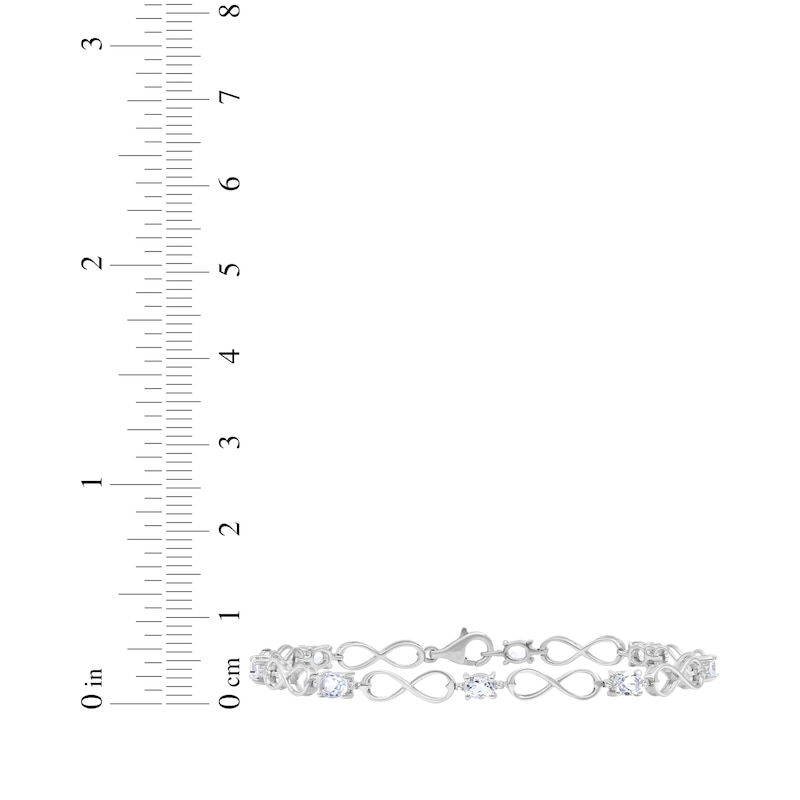 Main Image 3 of Oval-Cut Aquamarine and Diamond Accent Infinity Bracelet Sterling Silver 7.5"