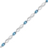 Thumbnail Image 2 of Oval-Cut Swiss Blue Topaz & Diamond Accent Infinity Bracelet Sterling Silver 7.25"