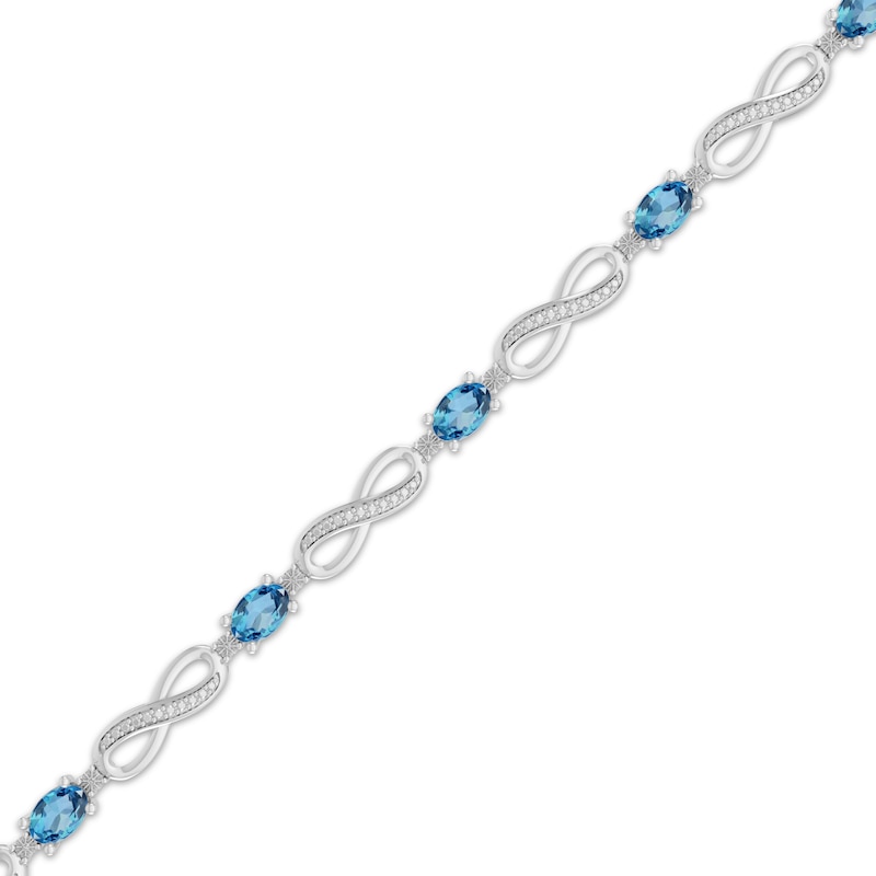 Main Image 2 of Oval-Cut Swiss Blue Topaz & Diamond Accent Infinity Bracelet Sterling Silver 7.25"