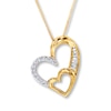 Thumbnail Image 0 of Previously Owned Diamond Heart Necklace 1/8 ct tw Round & Baguette 10K Yellow Gold