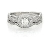 Thumbnail Image 1 of Previously Owned Neil Lane Round-Cut Diamond Halo Bridal Set 1-1/5 ct tw 14K White Gold Size 8.25