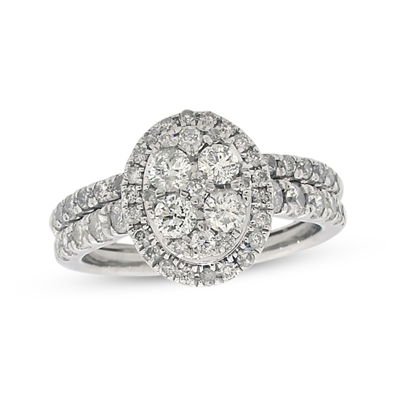 Main Image 1 of Previously Owned Multi-Diamond Center Oval Halo Bridal Set 1-1/4 ct tw 14K White Gold Size 6