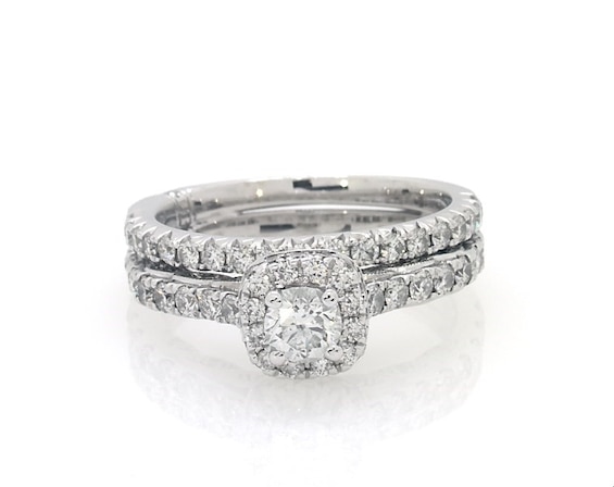 Previously Owned Monique Lhuillier Bliss Round-Cut Diamond Halo Bridal Set 1-1/6 ct tw 18K White Gold 6