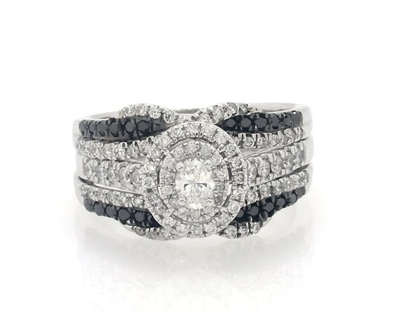 Previously Owned Oval-Cut Black & White Diamond Halo Bridal Set 7/8 ct tw 14K Gold 7.25