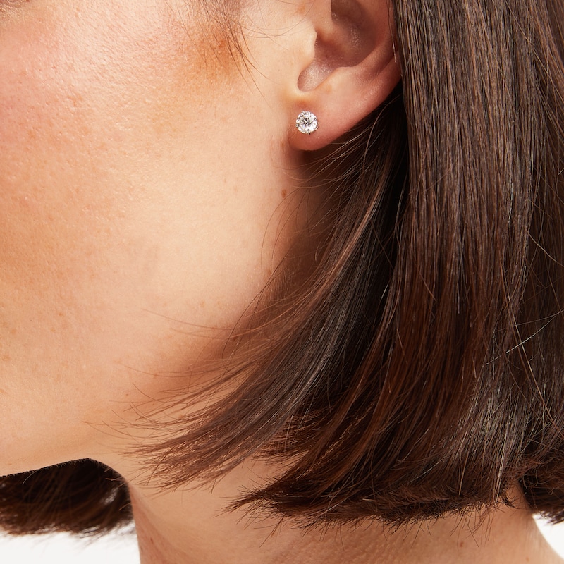 Main Image 4 of Previously Owned KAY Lab-Grown Diamonds Solitaire Stud Earrings 1 ct tw 14K White Gold (F/SI2)