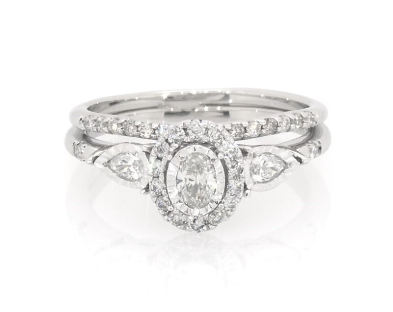 Main Image 1 of Previously Owned Oval-Cut Diamond Halo Bridal Set 3/8 ct tw 14K White Gold Size 5