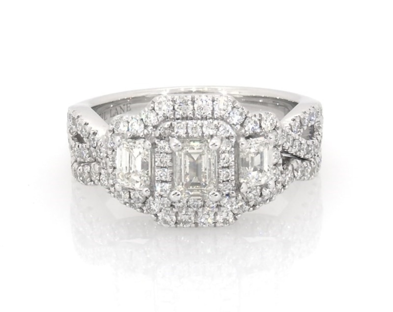 Main Image 1 of Previously Owned Neil Lane Emerald-Cut Diamond Three-Stone Halo Bridal Set 1-7/8 ct tw 14K White Gold Size 7.75