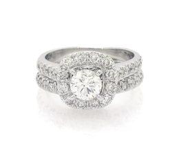 Previously Owned Neil Lane Round-Cut Diamond Halo Bridal Set 1-1/2 ct tw 14K White Gold Size 3.75