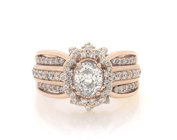Previously Owned Oval-Cut Diamond Halo Bridal Set 1-1/6 ct tw 14K Rose Gold Size 5.75