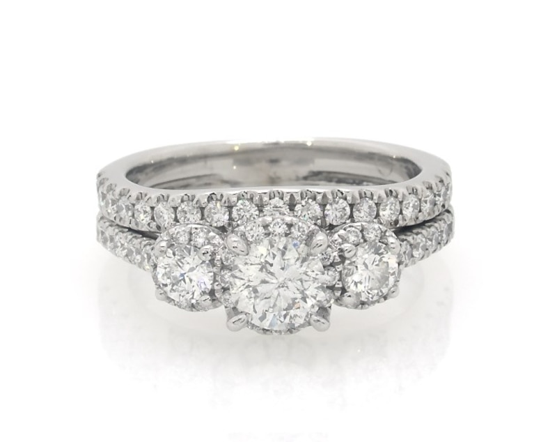 Main Image 1 of Previously Owned Round-Cut Diamond Three-Stone Halo Bridal Set 1-1/5 ct tw 14K White Gold Size 6