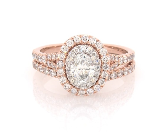 Previously Owned Neil Lane Oval-Cut Diamond Halo Bridal Set 1-1/2 ct tw 14K Two-Tone Gold Size 5.5