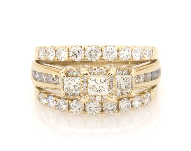 Main Image 1 of Previously Owned Princess-Cut Diamond Three-Stone Halo Bridal Set 1-7/8 ct tw 14K Yellow Gold Size 8.25