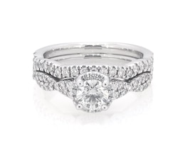 Previously Owned Round-Cut Diamond Halo Twist Shank Bridal Set 7/8 ct tw 14K White Gold Size 5.25