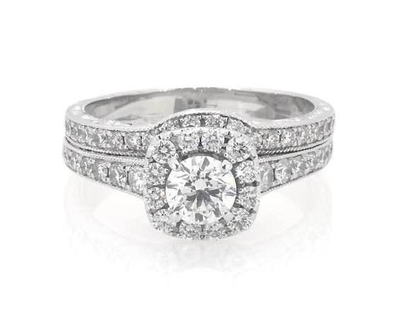 Previously Owned Neil Lane Round-Cut Diamond Halo Bridal Set 1-1/2 ct tw 14K White Gold Size 8.5