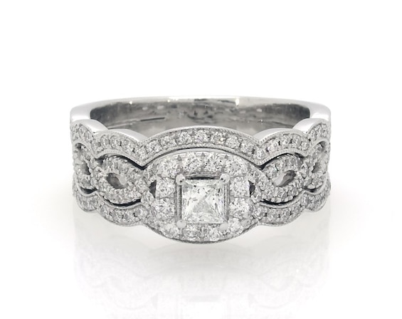 Previously Owned Neil Lane Princess-Cut Diamond Twist Shank Bridal Set 1 ct tw 14K White Gold 8.5