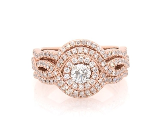 Previously Owned Round-Cut Diamond Halo Twist Bridal Set 7/8 ct tw 14K Rose Gold Size 5.75
