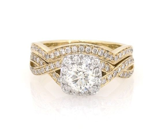 Previously Owned Neil Lane Round-Cut Diamond Halo Bridal Set 1-3/8 ct tw 14K Two-Tone Gold Size 6.5
