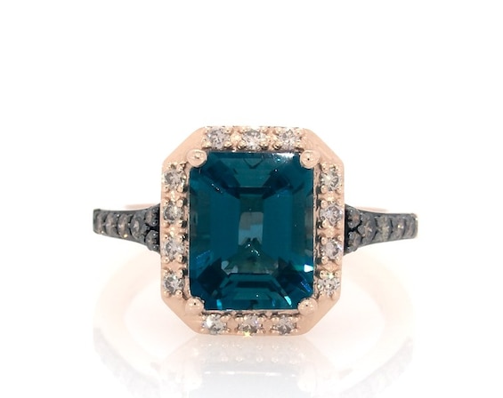 Previously Owned Le Vian Blue Topaz Ring 1/3 ct tw Diamonds 14K Strawberry Gold
