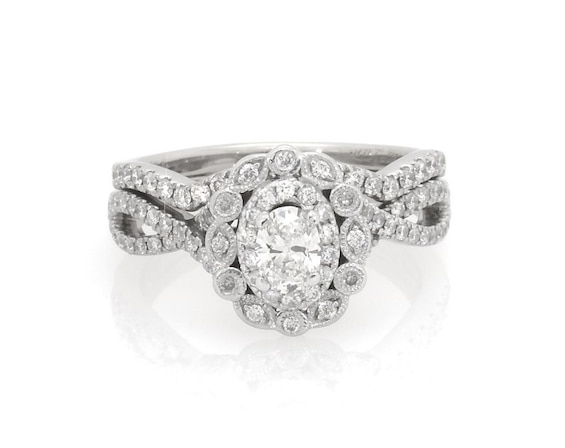 Previously Owned Neil Lane Oval-Cut Diamond Halo Bridal Set 7/8 ct tw 14K White Gold Size 6.75