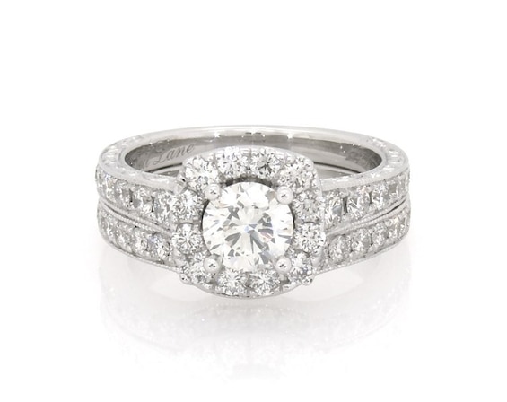 Previously Owned Neil Lane Round-Cut Diamond Halo Bridal Set 1-1/2 ct tw 14K White Gold Size 4.75