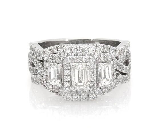 Previously Owned Neil Lane Emerald-Cut Diamond Three-Stone Halo Bridal Set 1-7/8 ct tw 14K White Gold Size 4