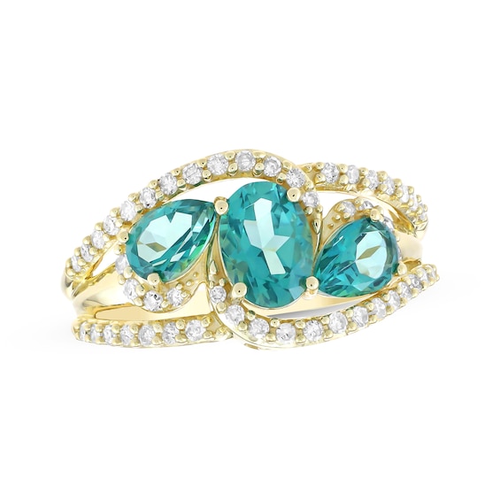 Previously Owned Oval-Cut & Pear-Shaped Oceanic Blue Topaz Diamond Bypass Ring 1/3 ct tw 10K Yellow Gold