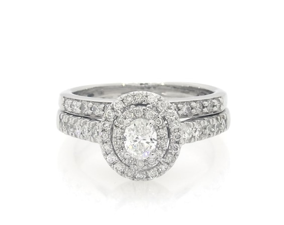 Previously Owned Oval-Cut Diamond Double Halo Bridal Set 1/2 ct tw 10K White Gold Size 4.5